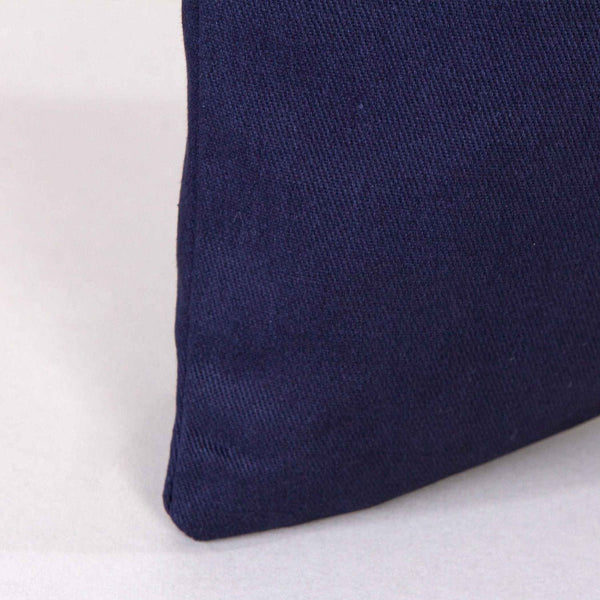 Navy blue fabric corner on a white background