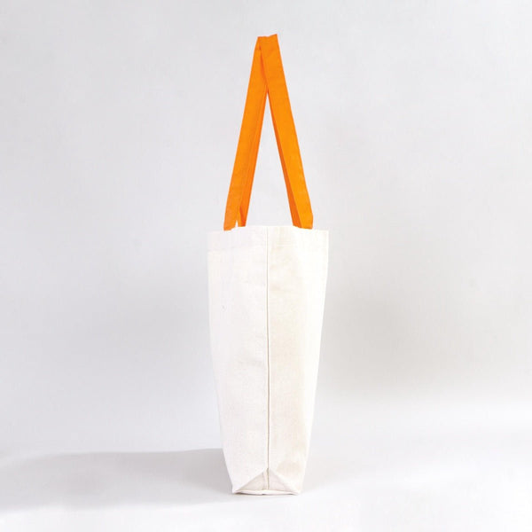 White tote bag with orange handles on a light gray background