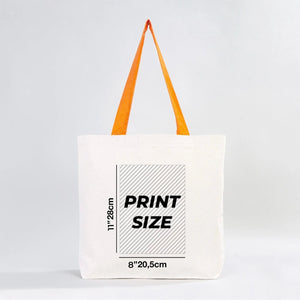 Tote bag with orange handles and print size information on a white background