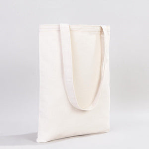 White tote bag on a light gray background