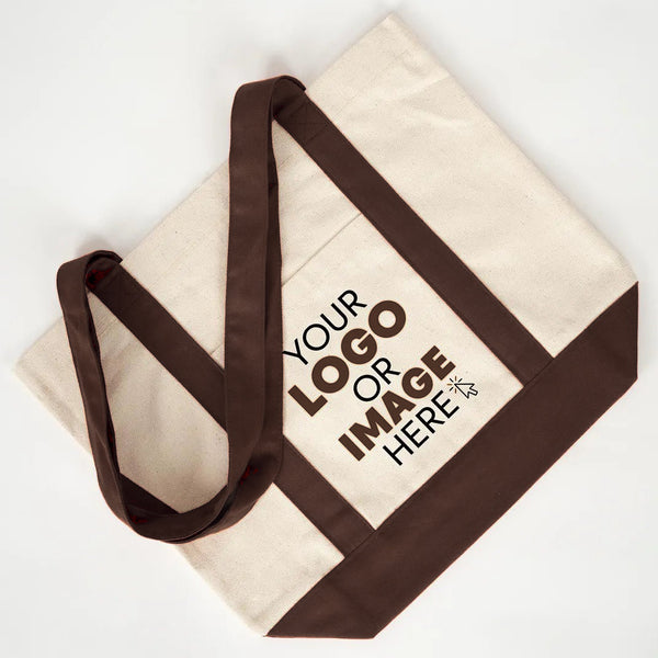 Flat lay of a personalized canvas tote with a sample logo print - Pamusan.com