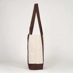 Side profile of the canvas tote with dark brown handle - Pamusan.com