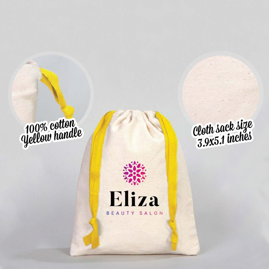 Canvas drawstring bag with yellow drawstrings and customizable text area on a gray background