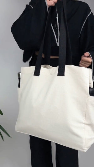 Canvas tote bag 40 x 35 x 15 cm product video showing the cotton fabric, wide gusset and two side pockets